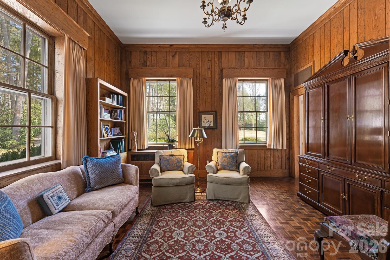 407 Vanderbilt Road Asheville, NC 28803 - Photo 29 of 48 a living room with furniture or couch and a window
