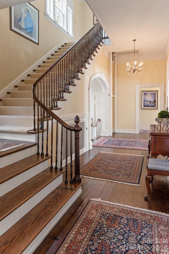 407 Vanderbilt Road Asheville, NC 28803 - Photo 30 of 48 a view of entryway and hall with wooden floor