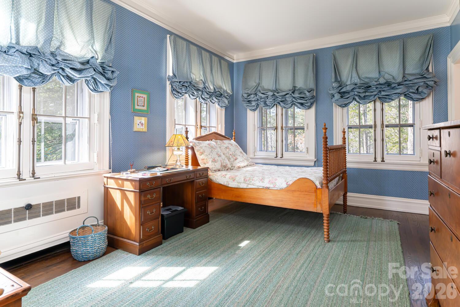 407 Vanderbilt Road Asheville, NC 28803 - Photo 36 of 48 a bed room with a bed and a window