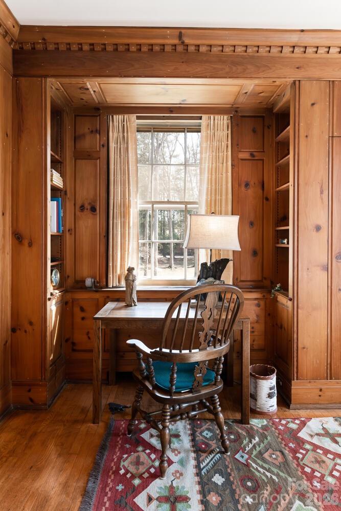 407 Vanderbilt Road Asheville, NC 28803 - Photo 42 of 48 a room with furniture and window