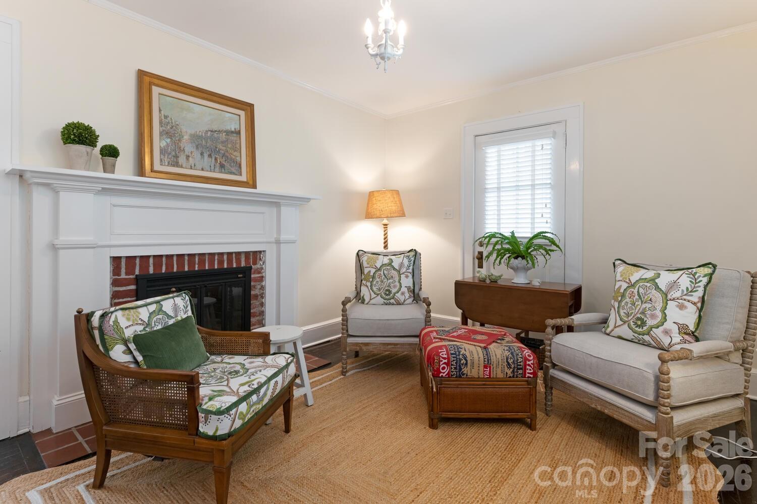 407 Vanderbilt Road Asheville, NC 28803 - Photo 47 of 48 a living room with furniture and a fireplace