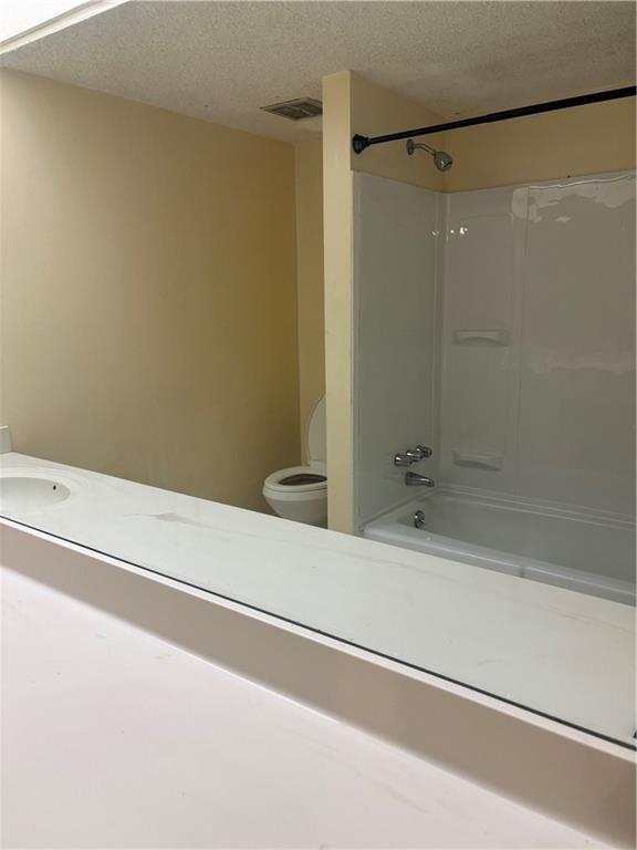 6851 Roswell Road, Unit I15 Atlanta, GA 30328 - Photo 13 of 29 a bathroom with a bathtub and a shower