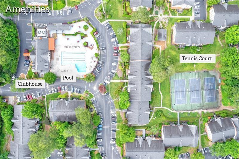 6851 Roswell Road, Unit I15 Atlanta, GA 30328 - Photo 25 of 29 a sign that is on a brick wall