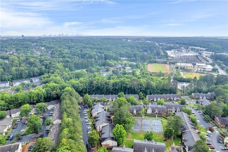 6851 Roswell Road, Unit I15 Atlanta, GA 30328 - Photo 28 of 29 an aerial view of a houses with a green space
