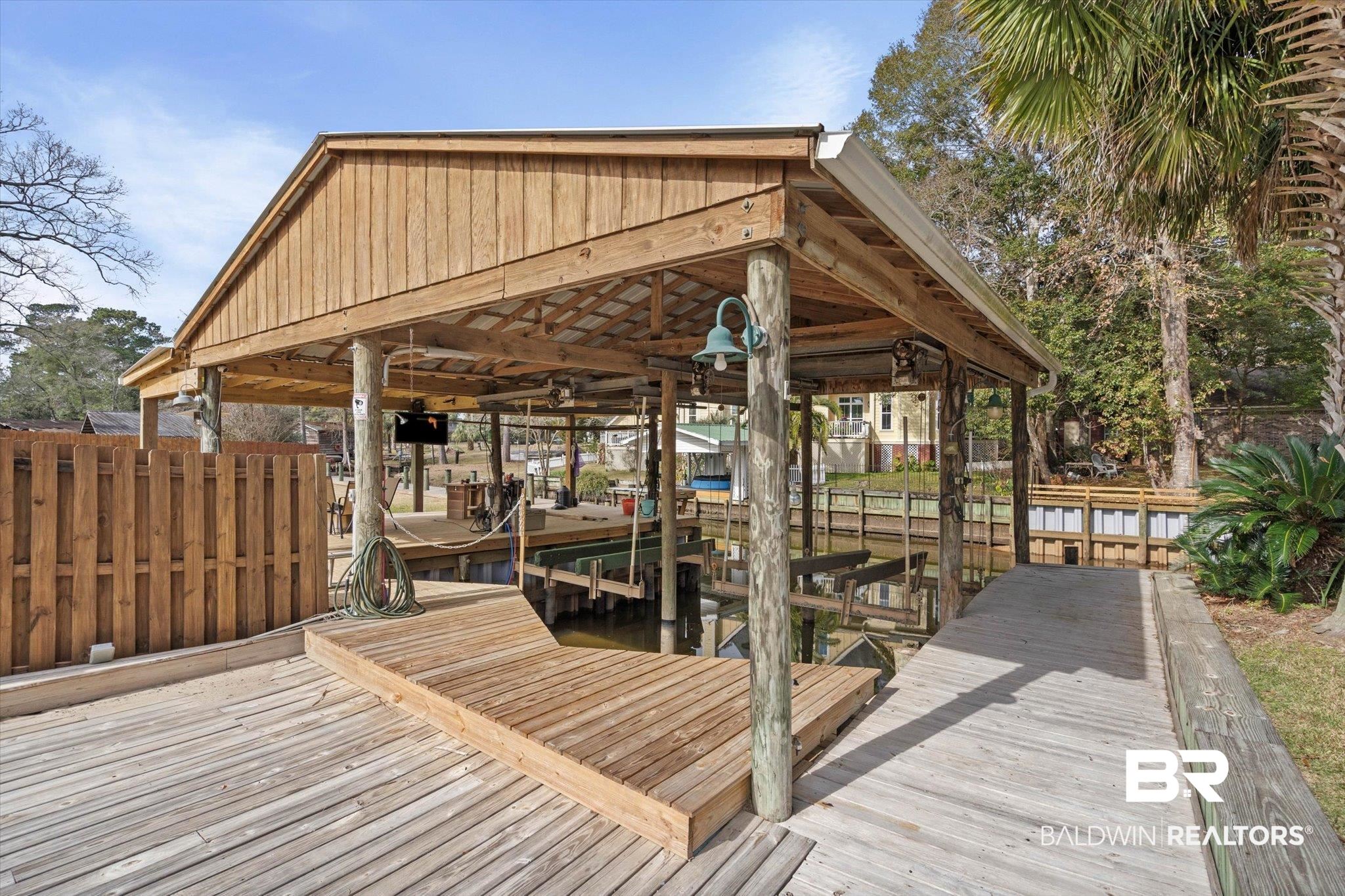 3720 Rabbit Creek Court Theodore, AL 36582 - Photo 30 of 47 Dock featuring boat lift