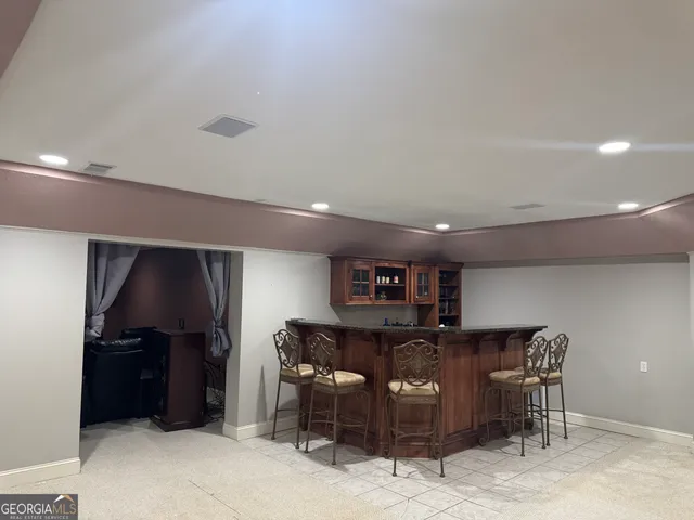 a view of a workspace with furniture