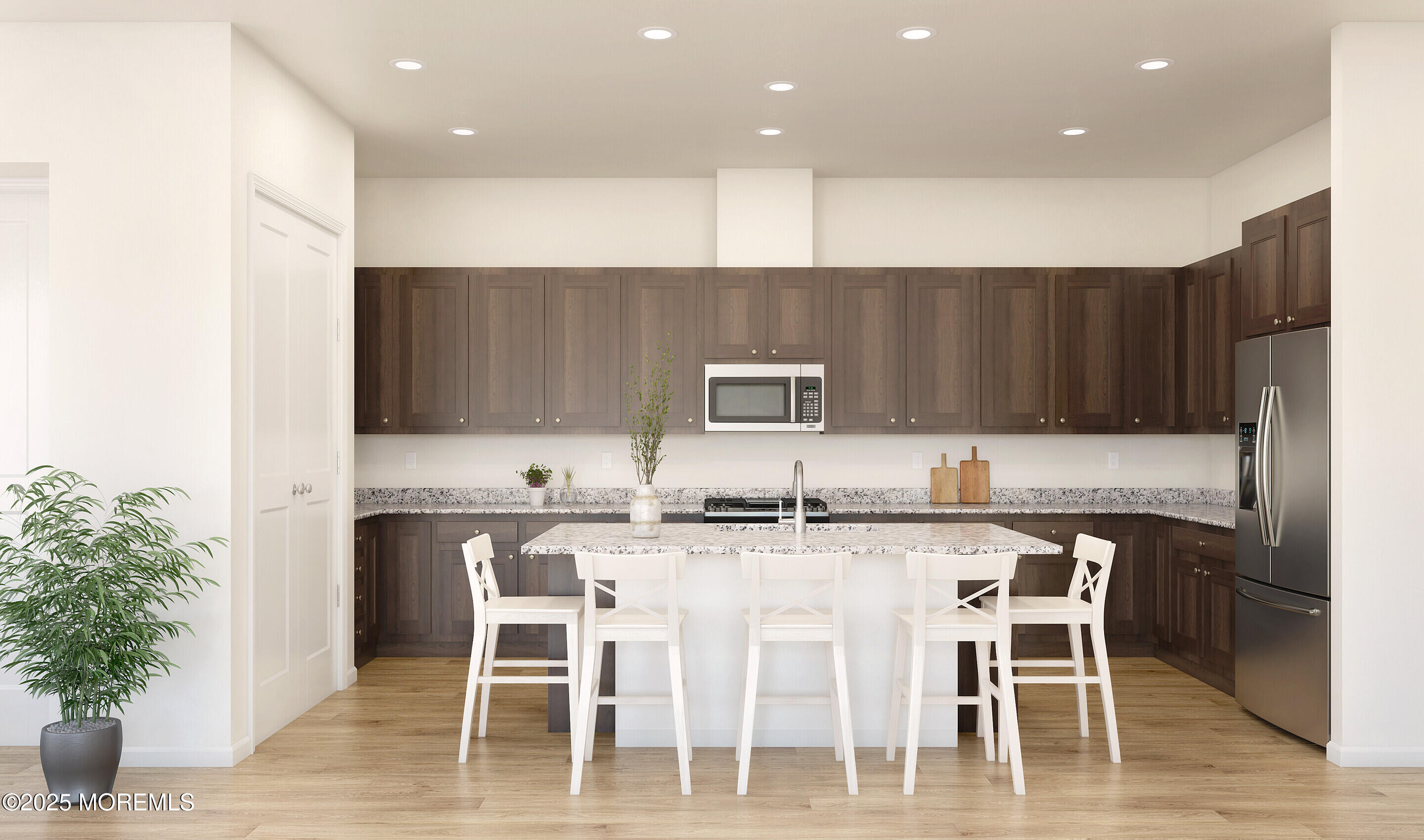176 Highway 33, Unit PALMERA Manalapan, NJ 07726 - Photo 24 of 45 a kitchen with kitchen island granite countertop a table and chairs in it