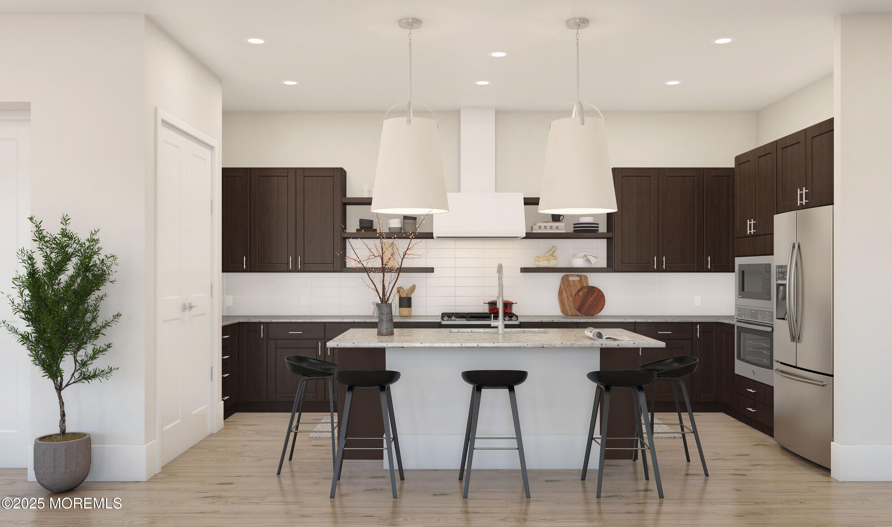 176 Highway 33, Unit PALMERA Manalapan, NJ 07726 - Photo 28 of 45 a kitchen with stainless steel appliances granite countertop a table chairs refrigerator and microwave