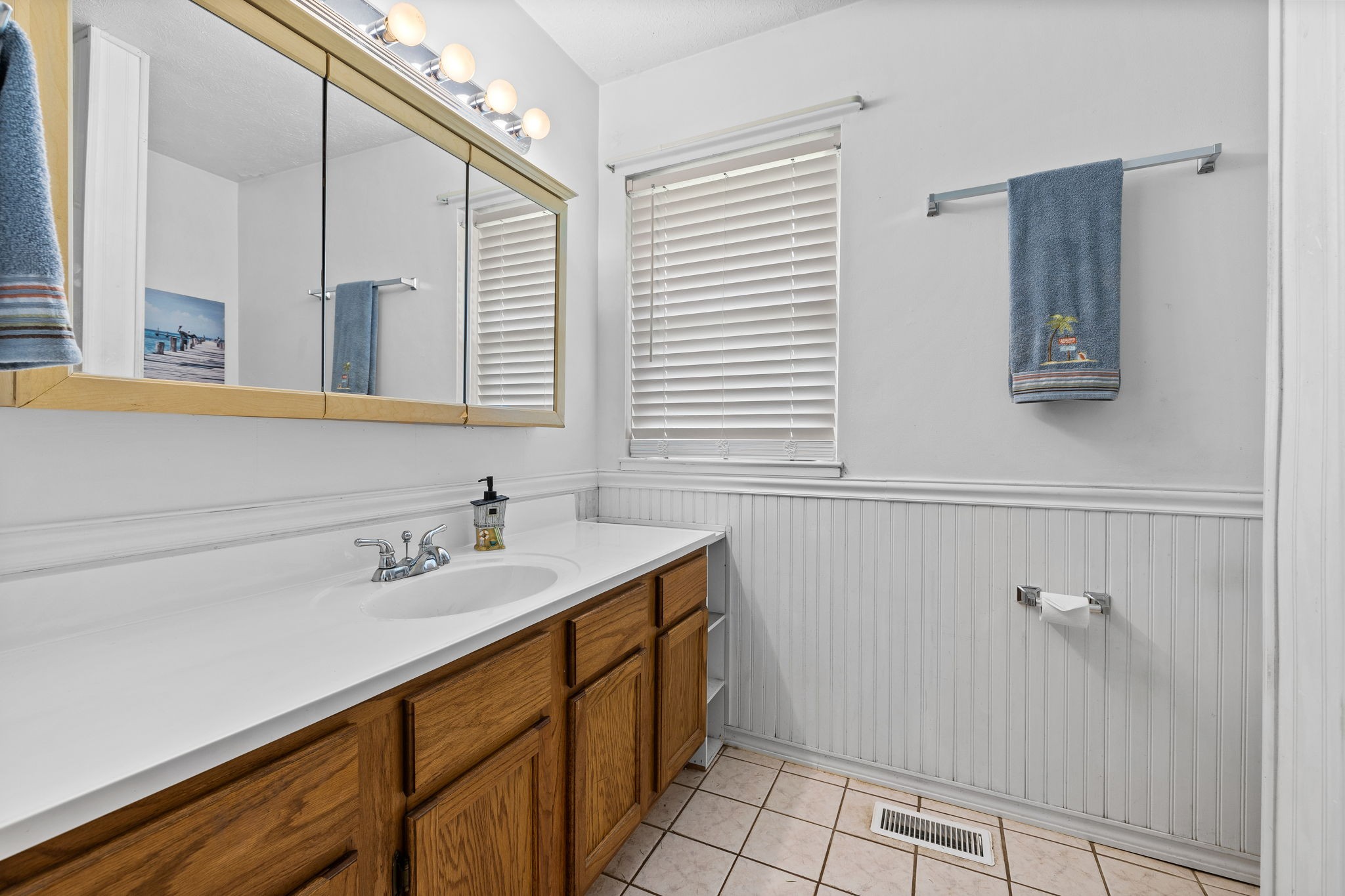 1165 Manley Loop Dickson, TN 37055 - Photo 20 of 29 a bathroom with a sink and a mirror