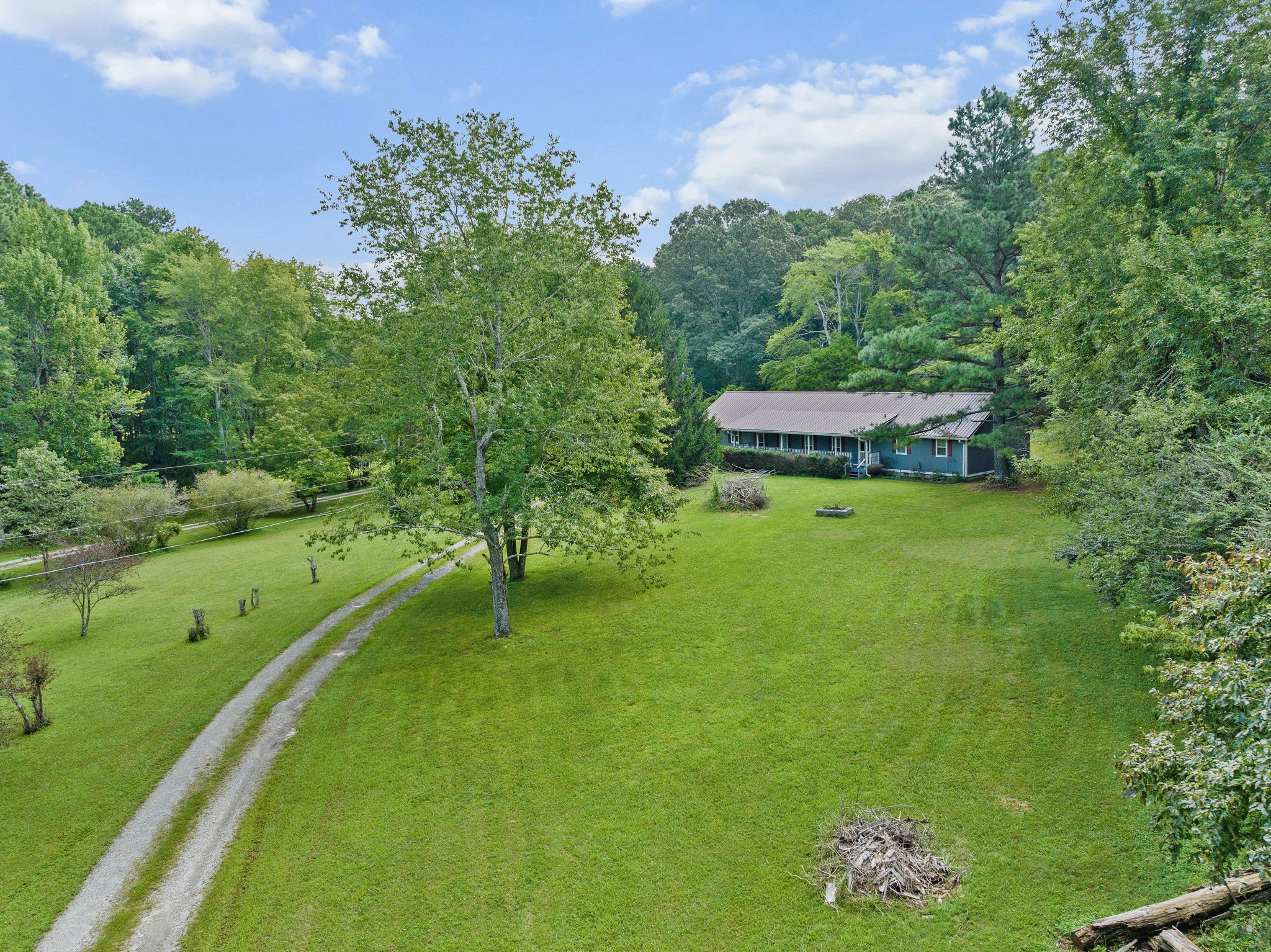 1165 Manley Loop Dickson, TN 37055 - Photo 2 of 29 a view of an outdoor space and a yard