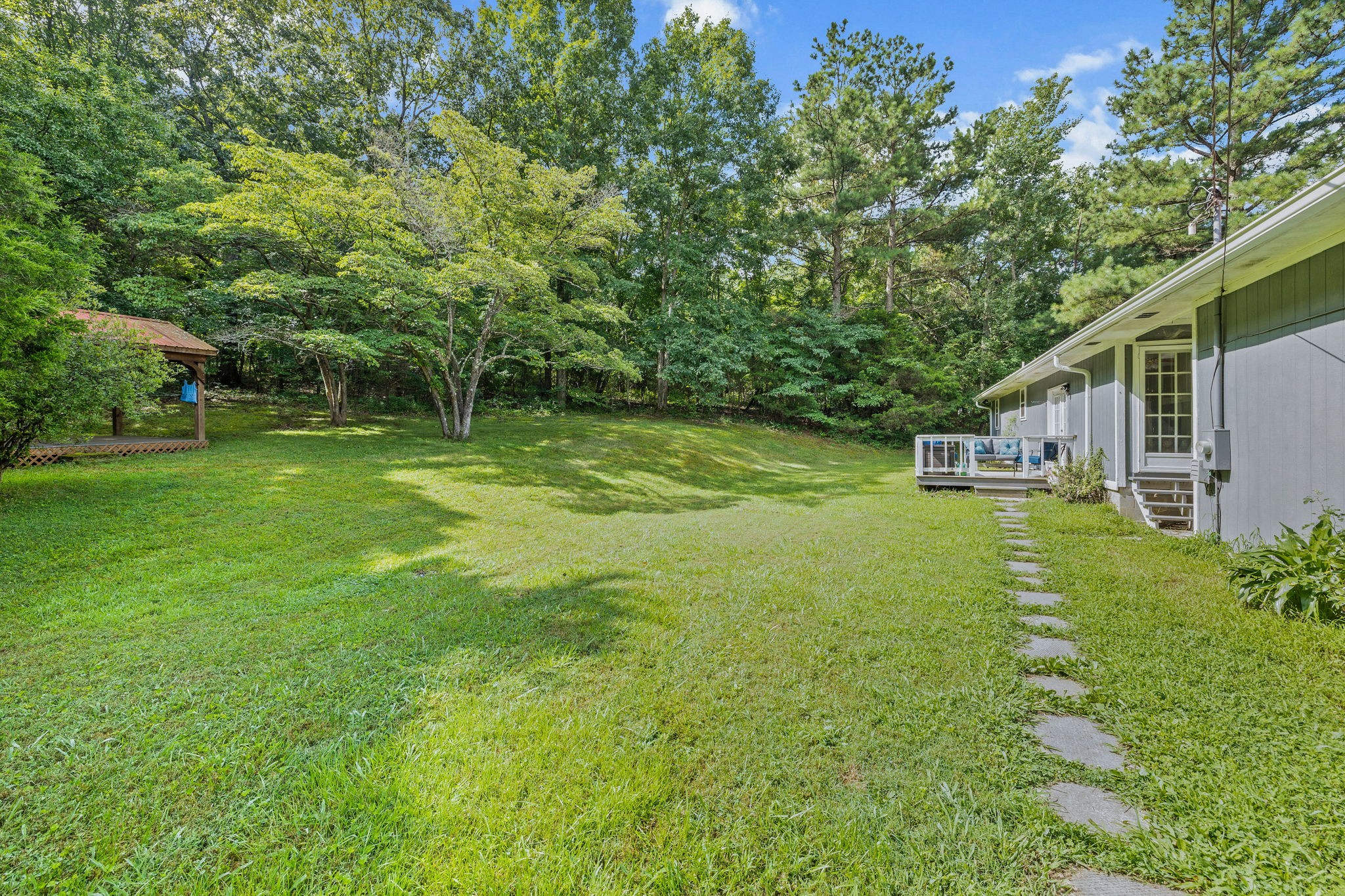 1165 Manley Loop Dickson, TN 37055 - Photo 21 of 29 a view of a house with a big yard