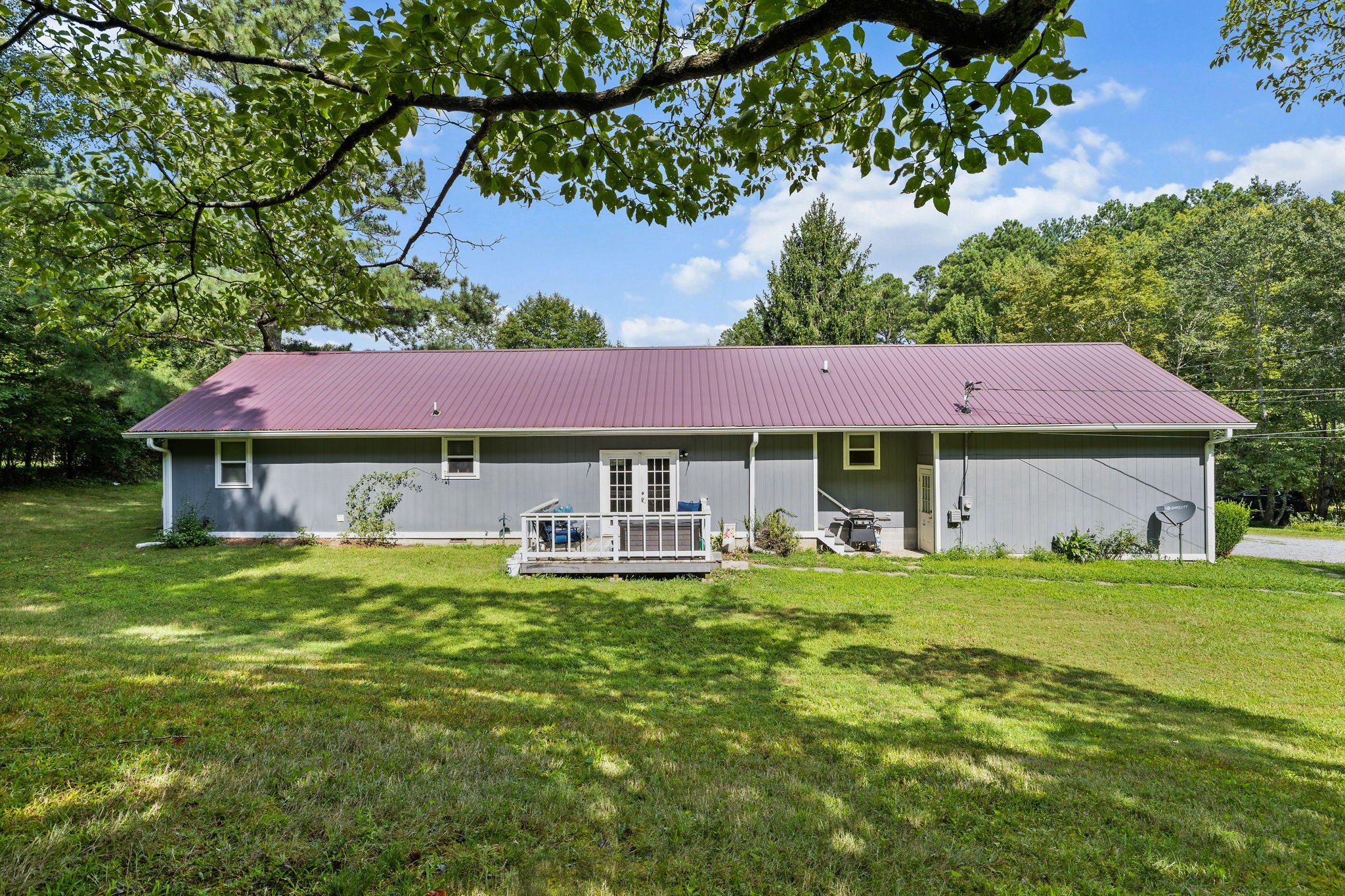 1165 Manley Loop Dickson, TN 37055 - Photo 22 of 29 a front view of a house with garden