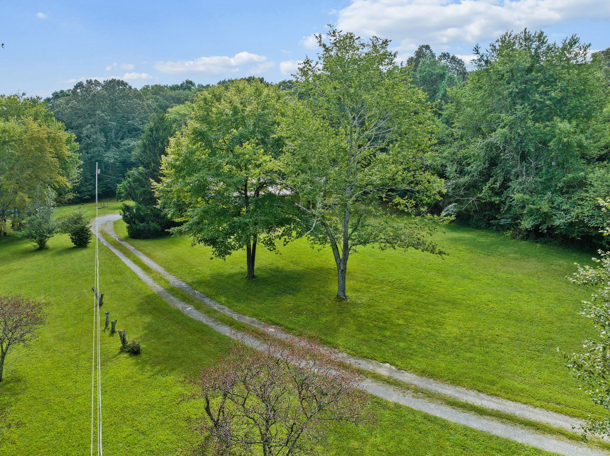 1165 Manley Loop Dickson, TN 37055 - Photo 27 of 29 a view of an outdoor space and basketball court