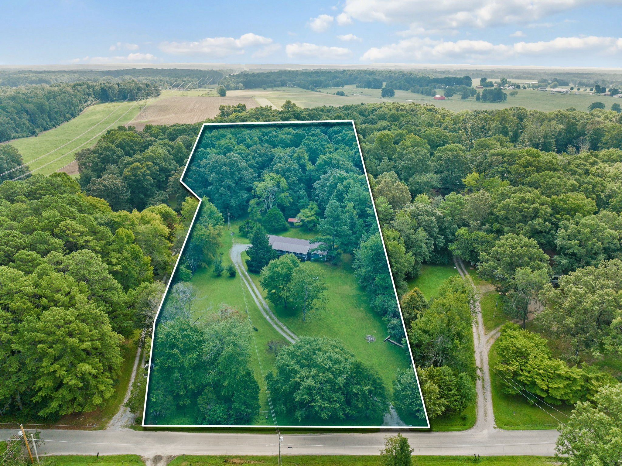 1165 Manley Loop Dickson, TN 37055 - Photo 29 of 29 a view of a yard with an outdoor seating