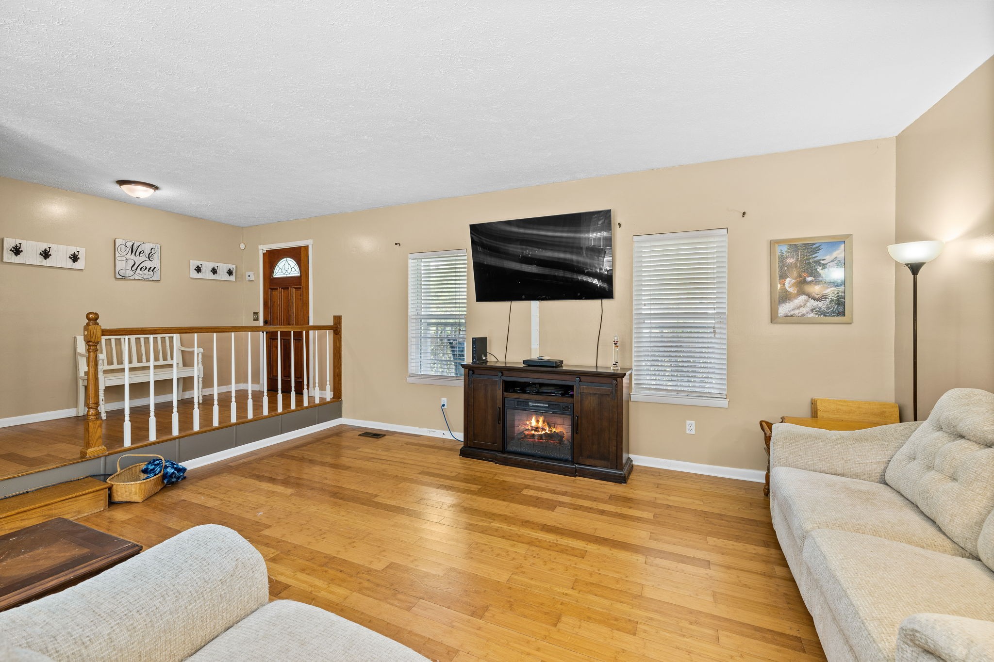 1165 Manley Loop Dickson, TN 37055 - Photo 6 of 29 a living room with furniture and a flat screen tv