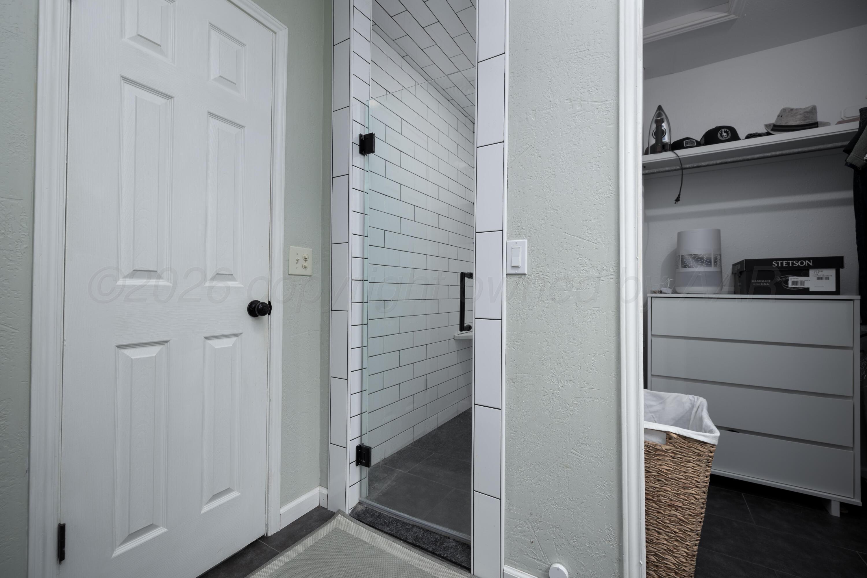 3509 Timber Drive Amarillo, TX 79121 - Photo 29 of 35 a bathroom with a bathtub