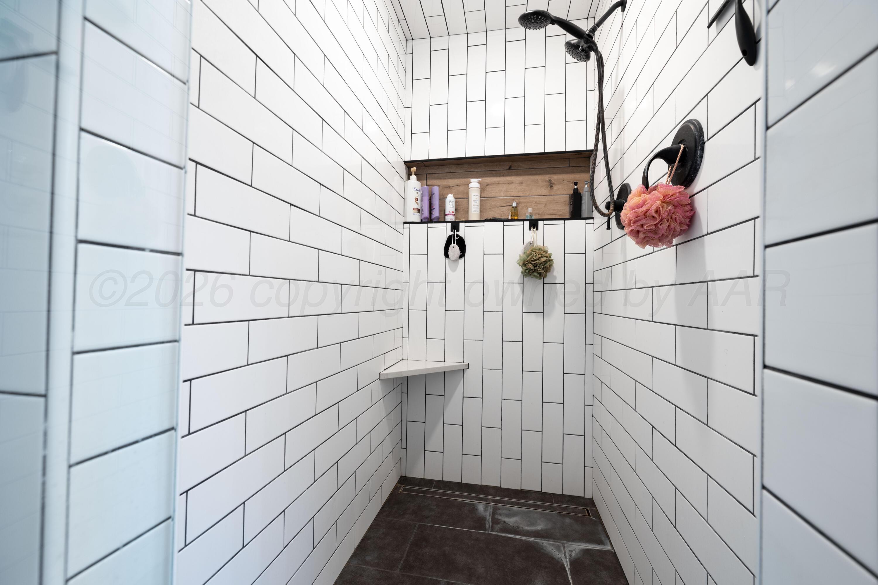 3509 Timber Drive Amarillo, TX 79121 - Photo 31 of 35 a bathroom with a shower