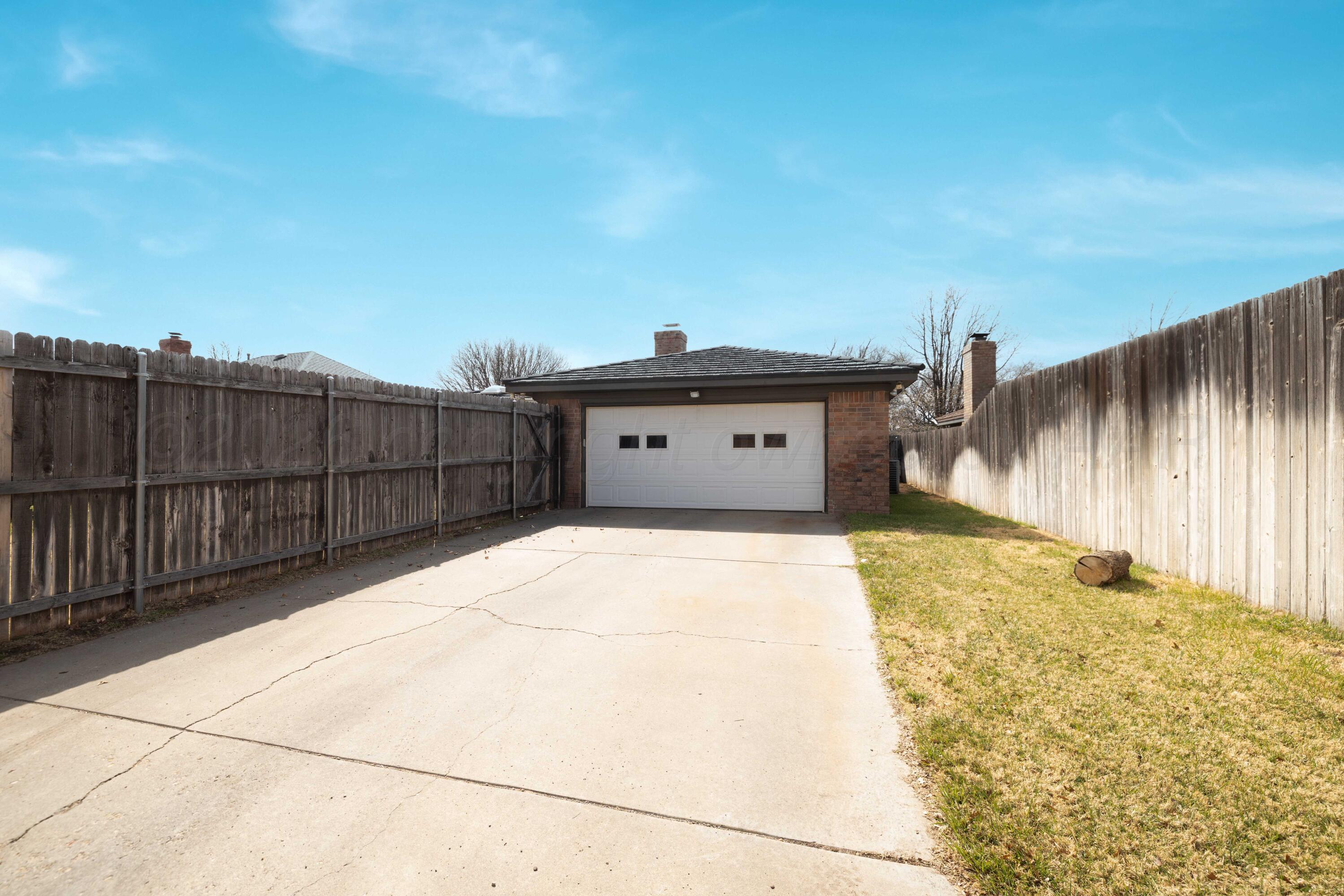 3509 Timber Drive Amarillo, TX 79121 - Photo 35 of 35 a front view of a house with a yard