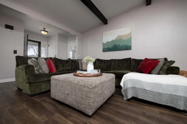 a living room with furniture and a couch