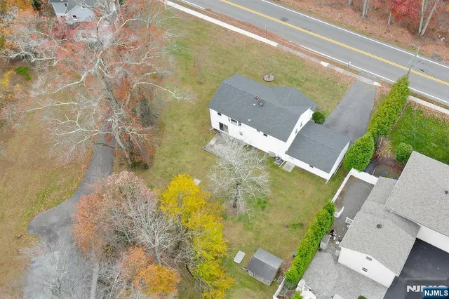 view of a bathroom with a shower and a fire place