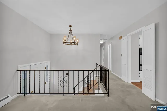 a view of a hallway with entryway