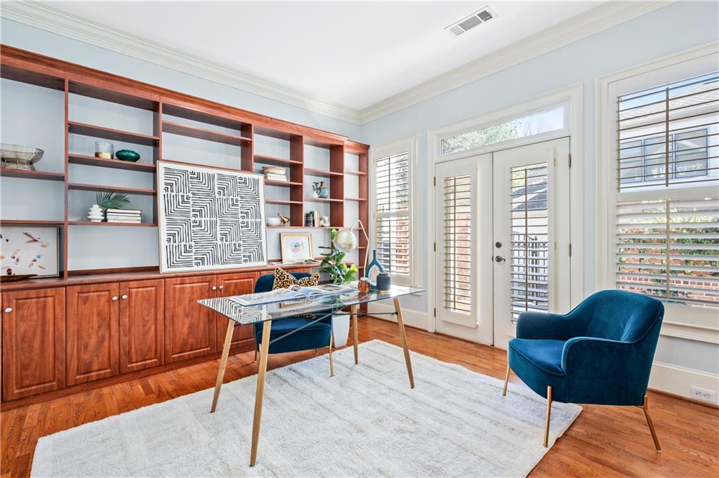 932 Manor Parc Drive Decatur, GA 30033 - Photo 14 of 38 a living room with furniture a large window and wooden floor