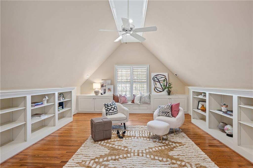 932 Manor Parc Drive Decatur, GA 30033 - Photo 25 of 38 a living room with furniture and a book shelf