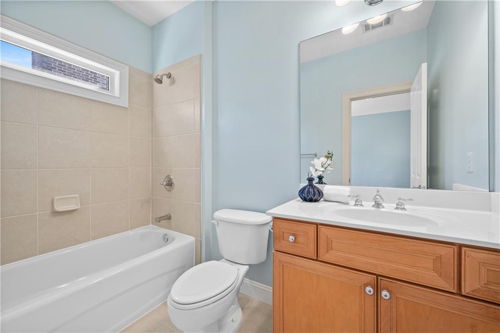 932 Manor Parc Drive Decatur, GA 30033 - Photo 29 of 38 a bathroom with a sink toilet vanity tub and shower