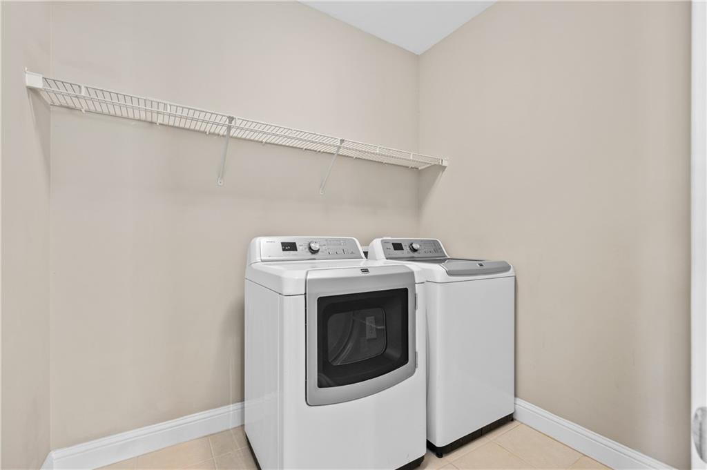 932 Manor Parc Drive Decatur, GA 30033 - Photo 30 of 38 a utility room with dryer and washer