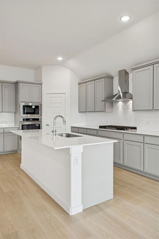 348 Yellowstar Lane Lavon, TX 75166 - Photo 10 of 39 a kitchen with granite countertop a sink cabinets and stainless steel appliances