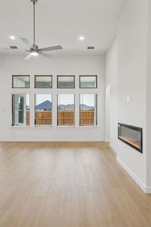 348 Yellowstar Lane Lavon, TX 75166 - Photo 14 of 39 a view of an empty room with a window