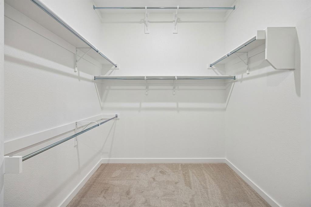348 Yellowstar Lane Lavon, TX 75166 - Photo 22 of 39 a view of an empty walk in closet