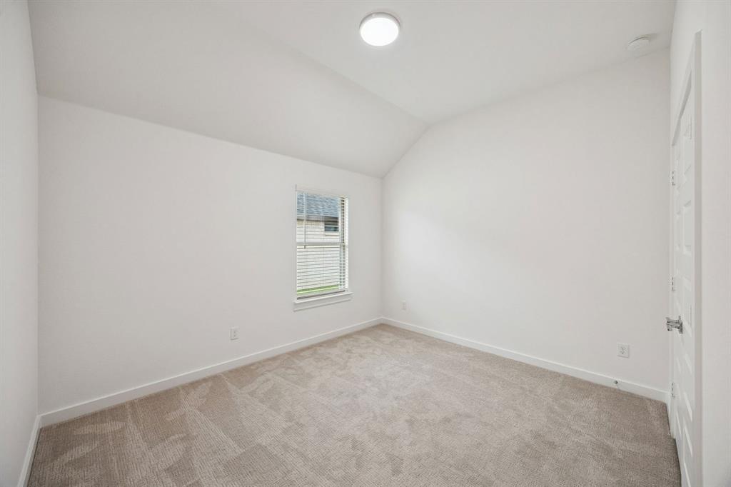 348 Yellowstar Lane Lavon, TX 75166 - Photo 24 of 39 an empty room with a window