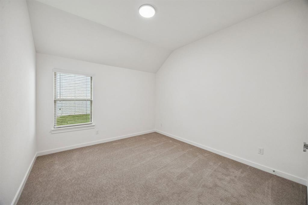 348 Yellowstar Lane Lavon, TX 75166 - Photo 25 of 39 an empty room with a window