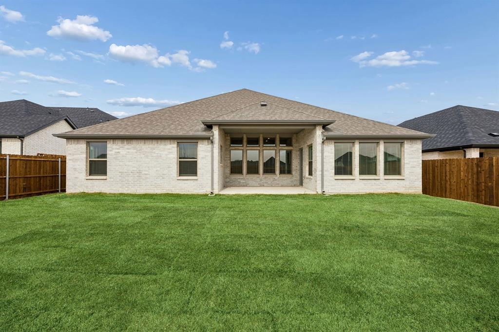 348 Yellowstar Lane Lavon, TX 75166 - Photo 34 of 39 a house view with a garden space