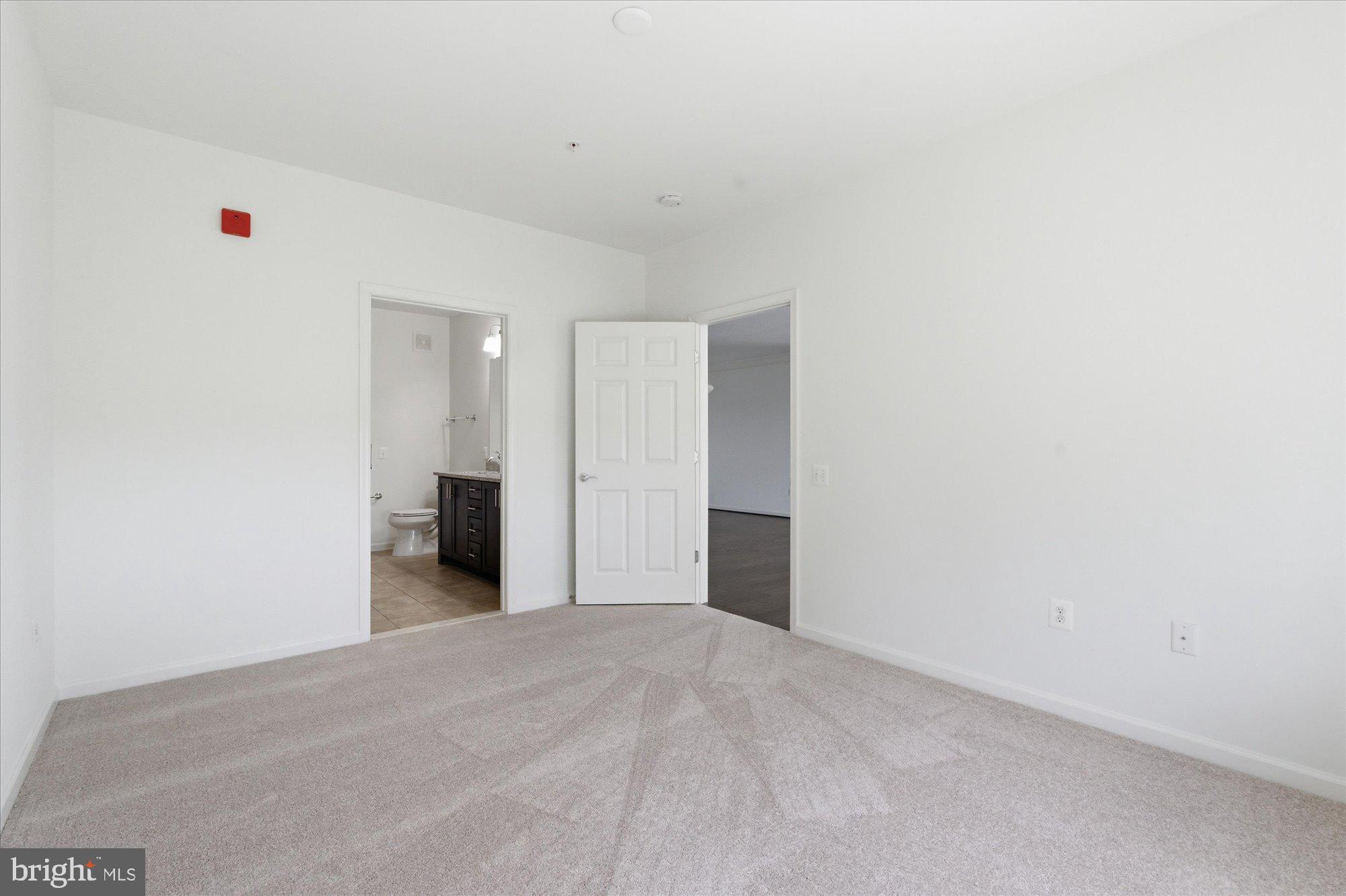 20650 Hope Spring Terrace, Unit 301 Ashburn, VA 20147 - Photo 27 of 35 Bedroom 2