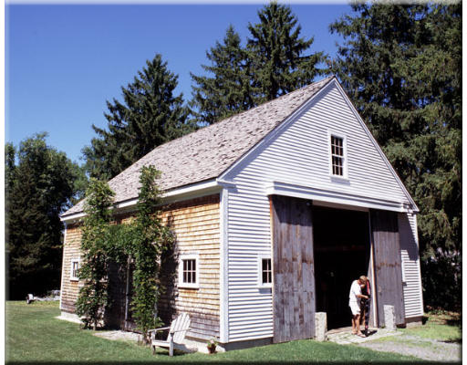 168 Argilla Road Ipswich, MA 01938 - Photo 13 of 27 a front view of a house with a garden