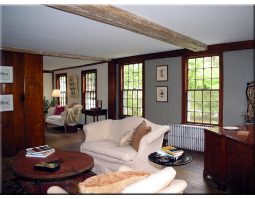 168 Argilla Road Ipswich, MA 01938 - Photo 17 of 27 a living room with furniture and a large window