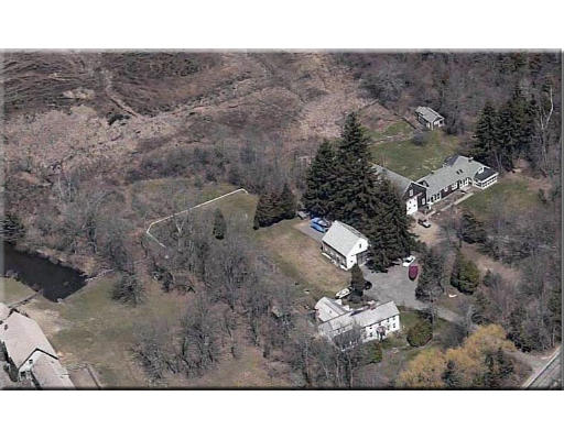 168 Argilla Road Ipswich, MA 01938 - Photo 5 of 27 a black and white photo of a house