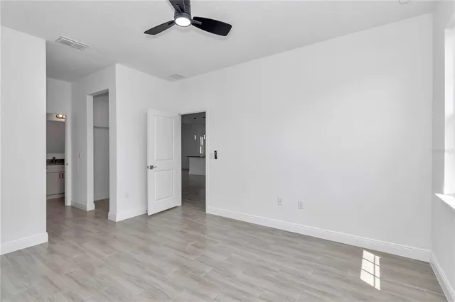 a view of small space with wooden floor