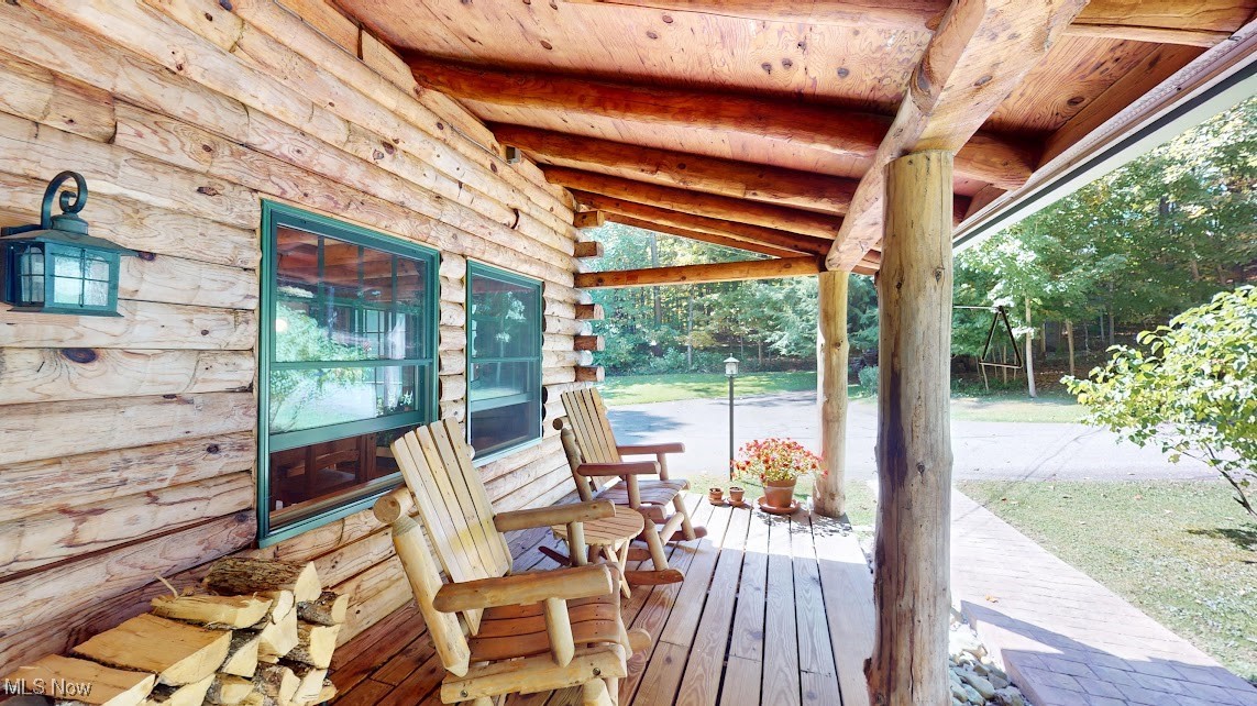 9471 Sherman Road Chesterland, OH 44026 - Photo 7 of 40 Relaxing side porch off the kitchen