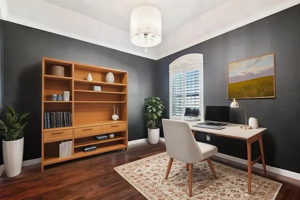 a workspace with furniture window and wooden floor