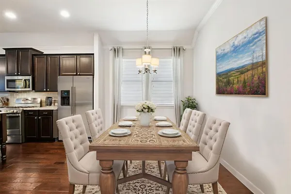 a view of a dining room with furniture
