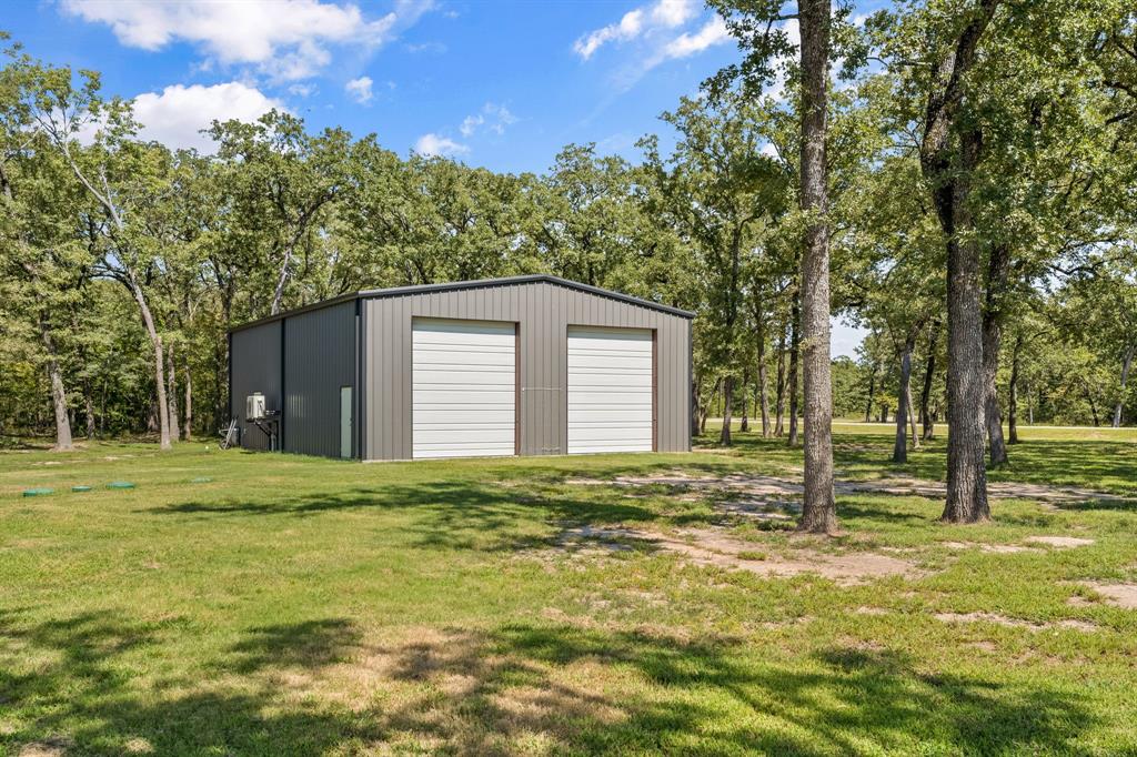 Tbd Tbd Anchor Point Quinlan, TX 75474 - Photo 3 of 40 a house with huge green field in front of it