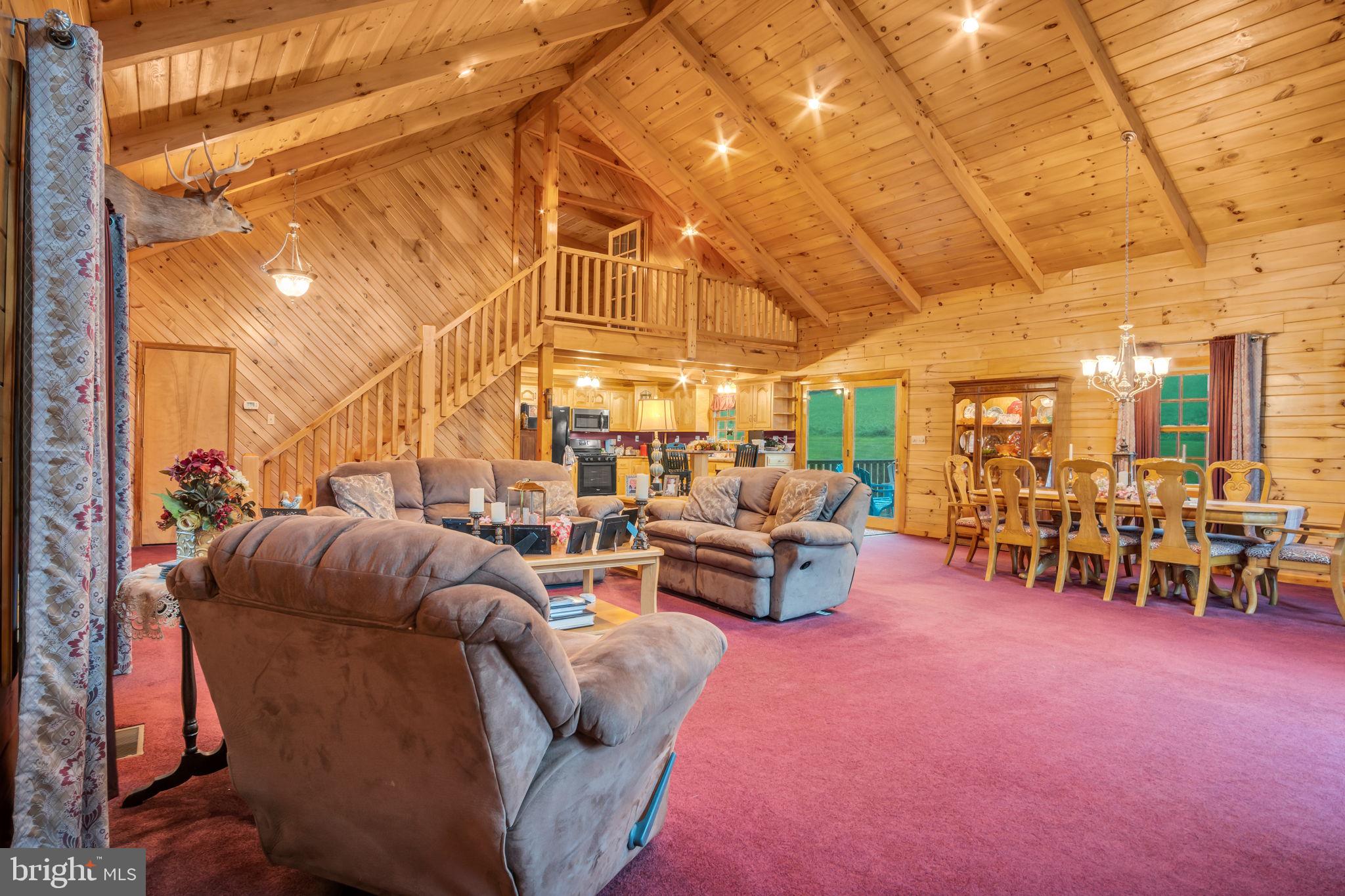 1105 Ridge Road Halifax, PA 17032 - Photo 24 of 61 a living room with lots of furniture and a table