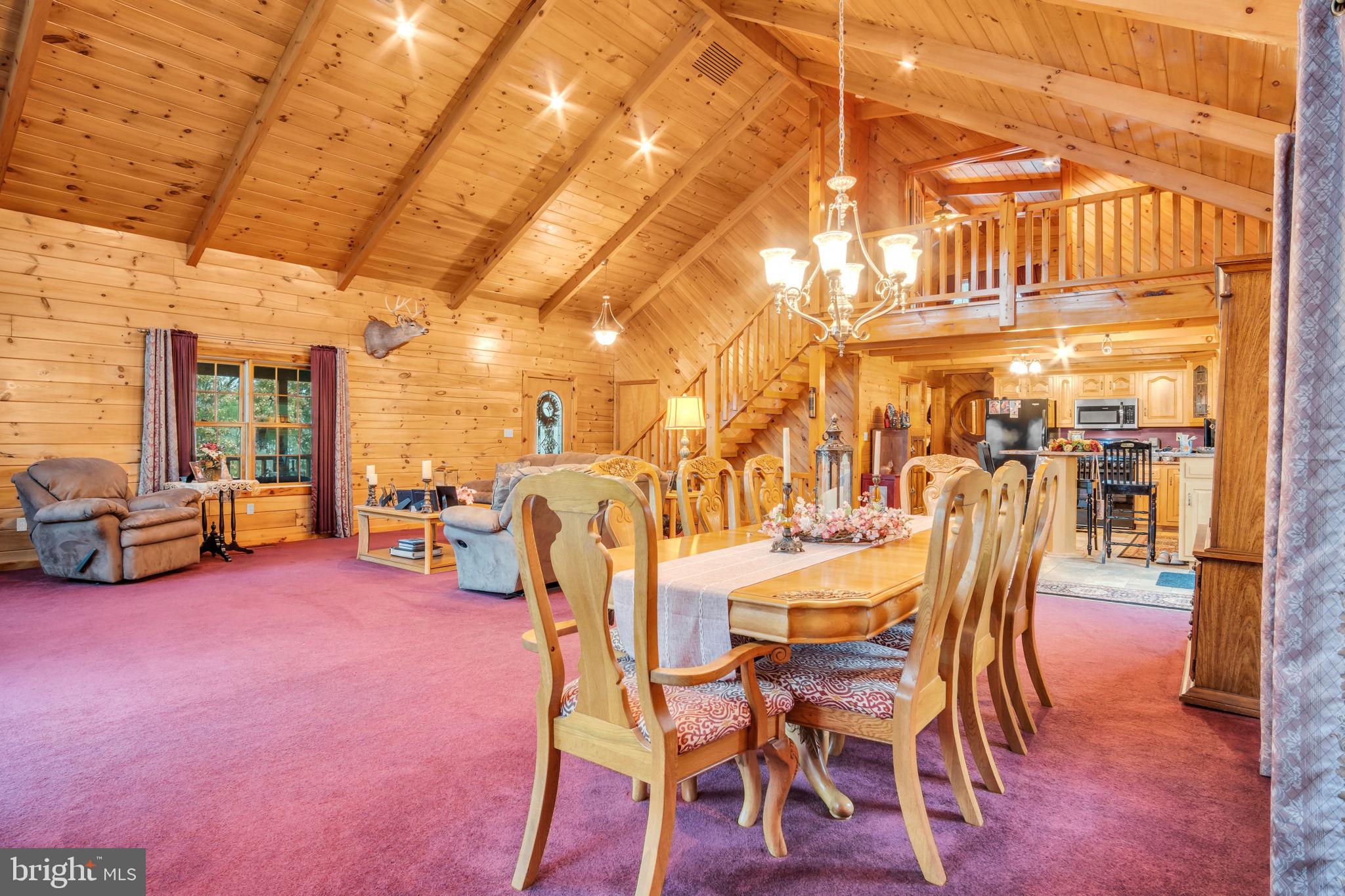 1105 Ridge Road Halifax, PA 17032 - Photo 25 of 61 a view of a dining room with furniture and a chandelier