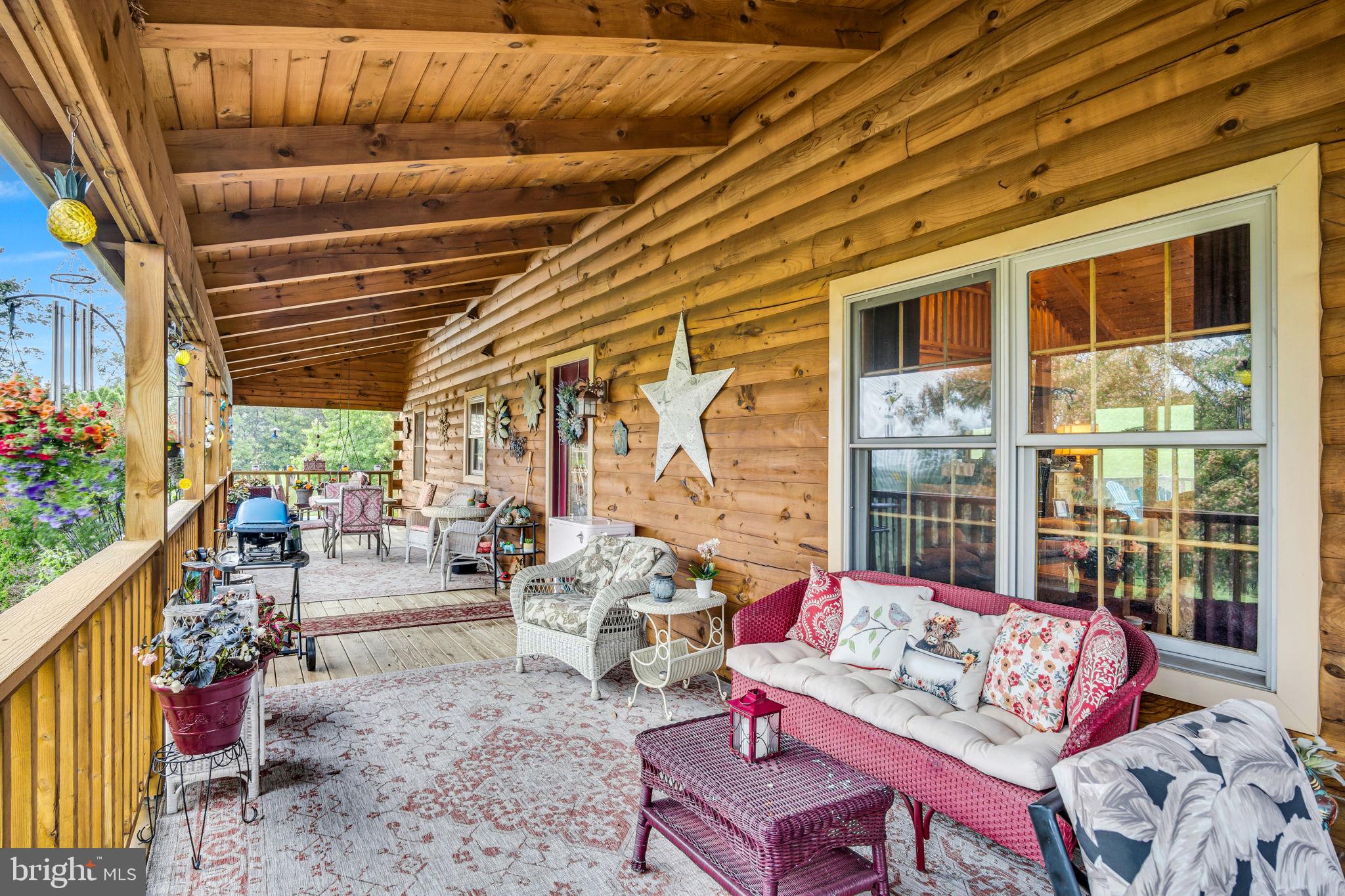 1105 Ridge Road Halifax, PA 17032 - Photo 44 of 61 a outdoor living space with patio furniture and garden