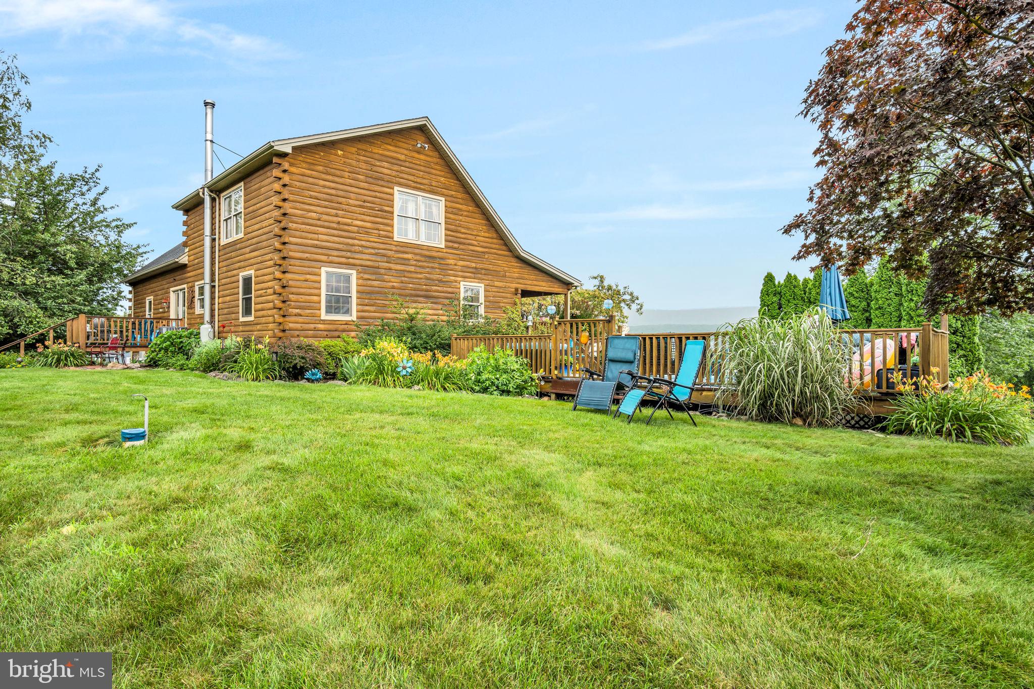 1105 Ridge Road Halifax, PA 17032 - Photo 48 of 61 a front view of house with yard and green space