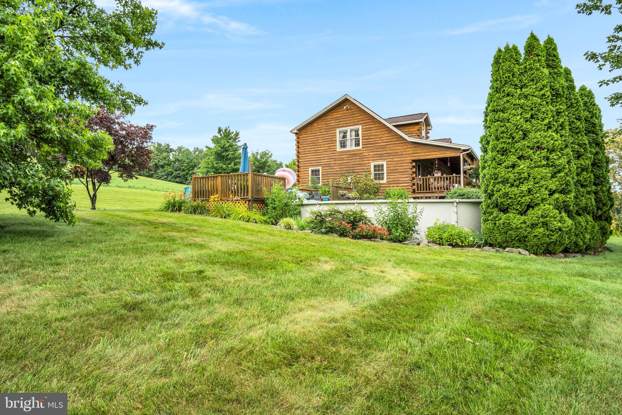 1105 Ridge Road Halifax, PA 17032 - Photo 50 of 61 a front view of a house with a yard