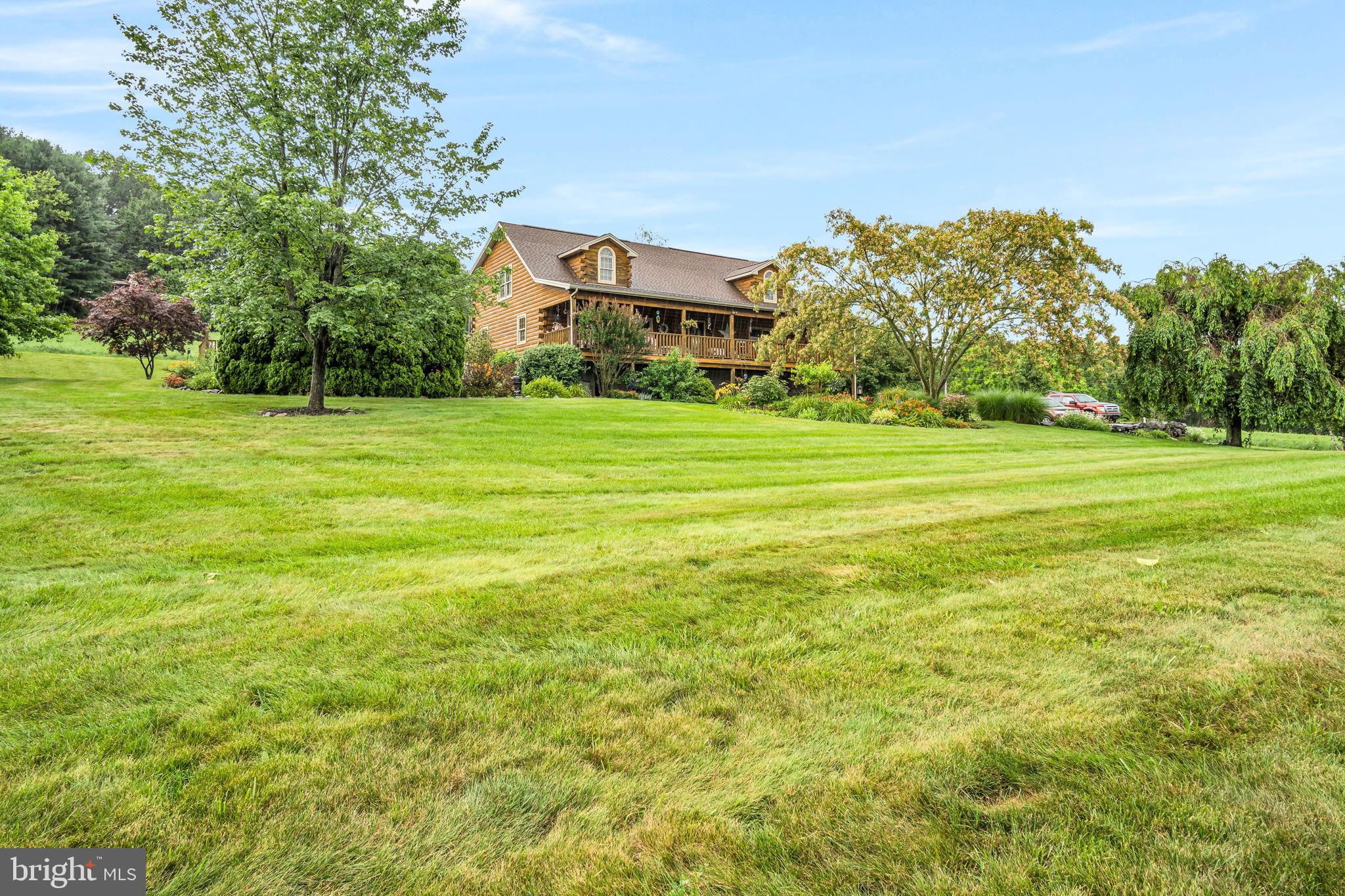 1105 Ridge Road Halifax, PA 17032 - Photo 51 of 61 a view of a big yard with a large trees